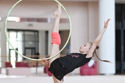 Yana Zaikina during an exercise with a hoop