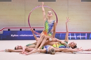 Gymnasts during an exercise with hoops