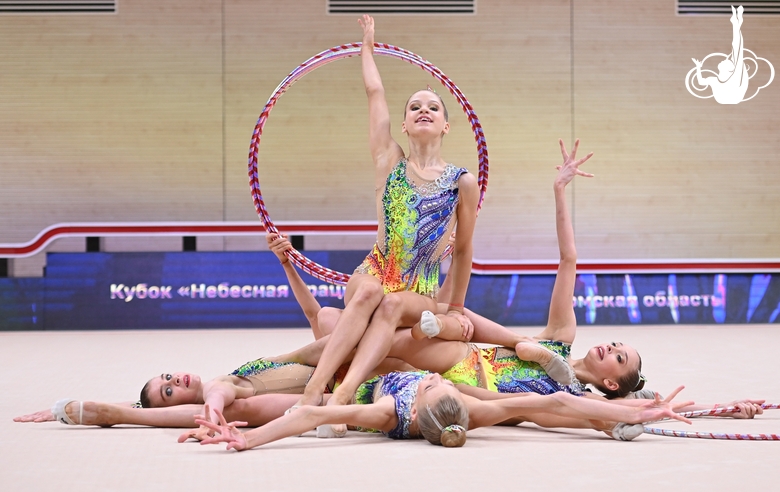 Gymnasts during an exercise with hoops