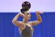 Lala Kramarenko during an exercise with a ball