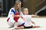 Academy Coach Olga Frolova with a young gymnast during the selection