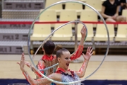 Gymnasts during an exercise with hoops