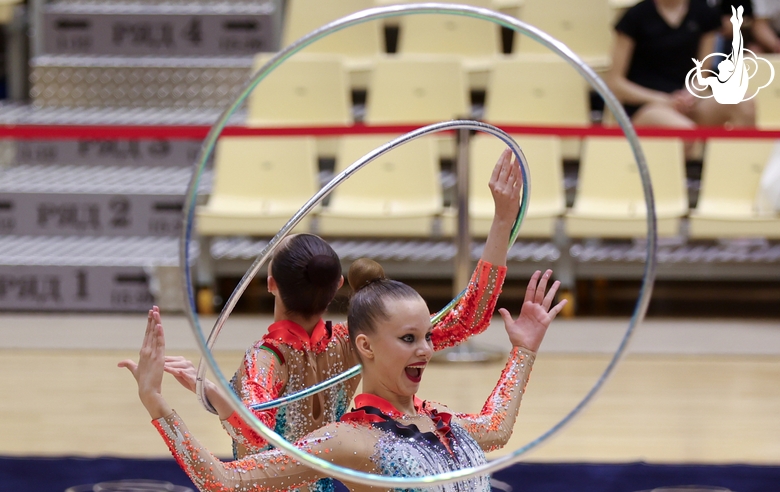 Gymnasts during an exercise with hoops