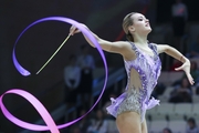 Maria Pobedushkina (Russia)  doing an exercise with a ribbon