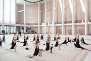 Dina and Arina Averina with gymnasts during the master class at the Academy