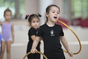 Young gymnasts during training