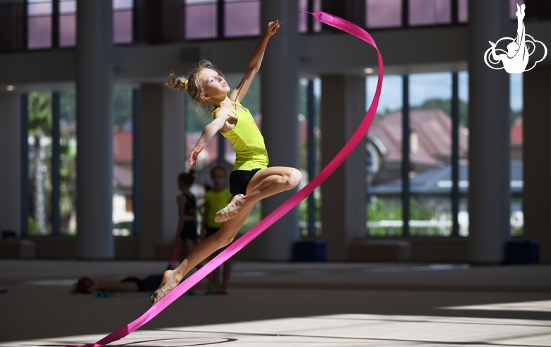 Gymnast during exercise with ribbon