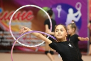 Valeria Medvedeva during an exercise with a hoop at floor testing