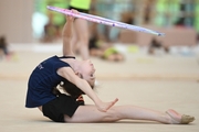 Gymnast during an exercise with a hoop at training