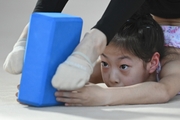 A gymnast from China during the workout