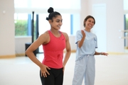 Gymnast Kimaya Karle and choreographer Ekaterina Belova during a class